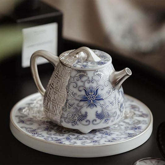 إبريق شاي شي بياو أزرق وأبيض مطلي بالفضة والذهب