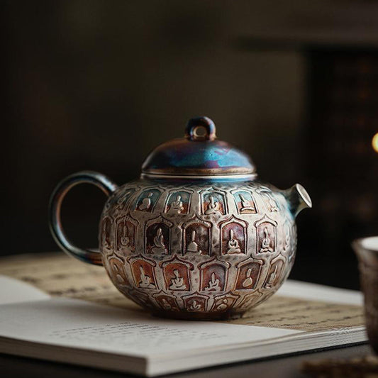 إبريق شاي سيراميك ملون مطلي بالفضة على شكل بوذا